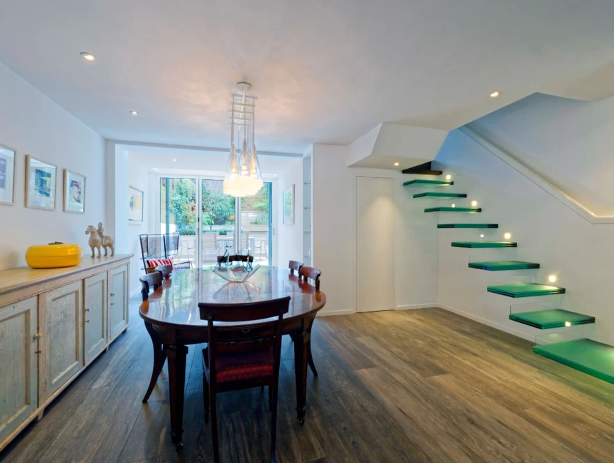 Modern house renovation in Notting Hill, London with floating stairs