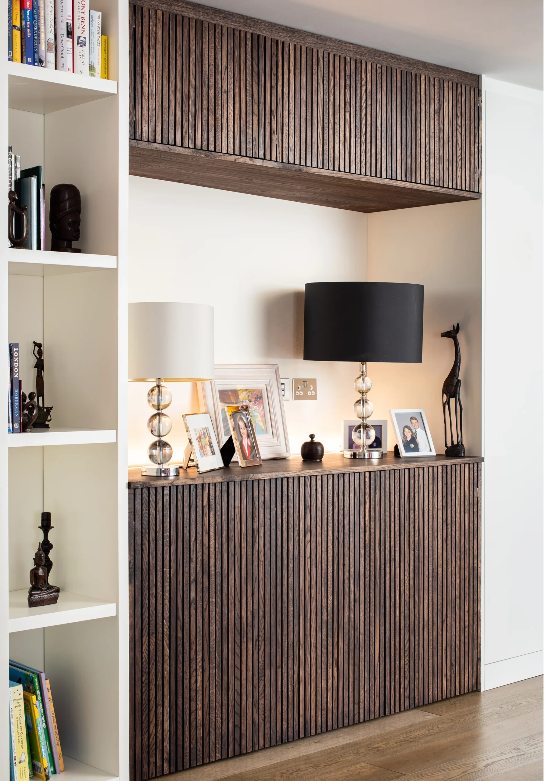 Hafer-Rd_2160px_10 Fitted oak-slatted cabinet and shelving built into a living room alcove