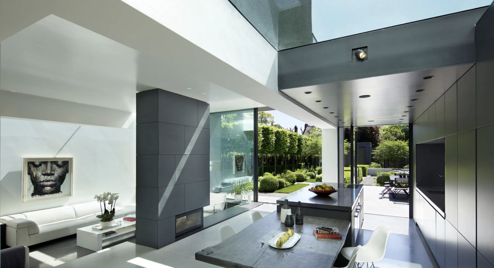 Minimalist modern kitchen overlooking the garden in Hampstead, London
